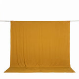 Mustard yellow fabric backdrop on hanging rod, studio background#whtbkgd