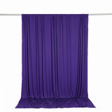 Purple sheer backdrop curtain on hanging rod, studio photo backdrop
