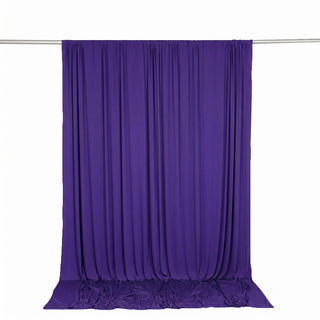 Purple sheer backdrop curtain on hanging rod, studio photo backdrop