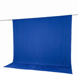 Blue fabric backdrop hanging on a crossbar, studio background setup
