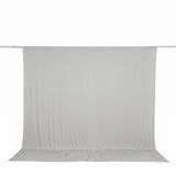 Light gray photography backdrop with fabric drape on support rod#whtbkgd