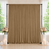 Elegant taupe wedding backdrop with floral arrangements and candle décor