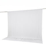 White sheer curtain backdrop hanging on a rod, studio background