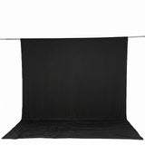 Black photography backdrop with seamless floor and hanging support pole