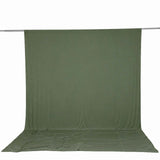 Olive green photography backdrop on a support rod