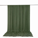 Olive green draped fabric backdrop on seamless studio backdrop stand