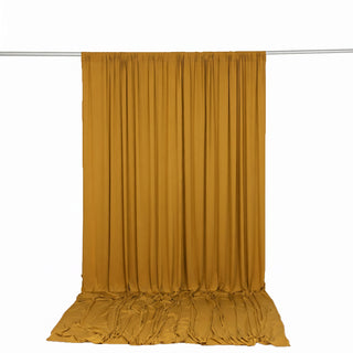 Mustard gold draped curtain panel on rod, studio product display
