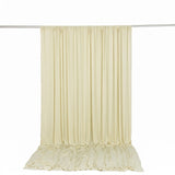 Cream pleated curtain backdrop on white background