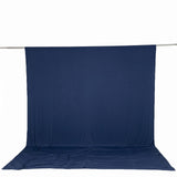 Blue photography backdrop with floor sweep on support rod
