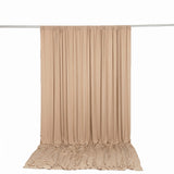 Beige draped backdrop curtain on support rod, studio photography background