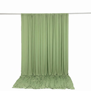 Light green sheer curtain backdrop with rod and floor drape