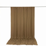 Brown draped fabric curtain backdrop on a rod, studio photography background