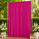 Fuchsia backdrop curtain with gold frame and floral wedding decor
