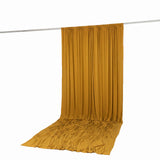 Mustard yellow draped curtain on rod, studio product shot