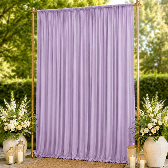 Lavender pleated wedding backdrop with gold frame and floral lantern decor