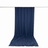 Navy blue draped fabric backdrop on a rod against a white background