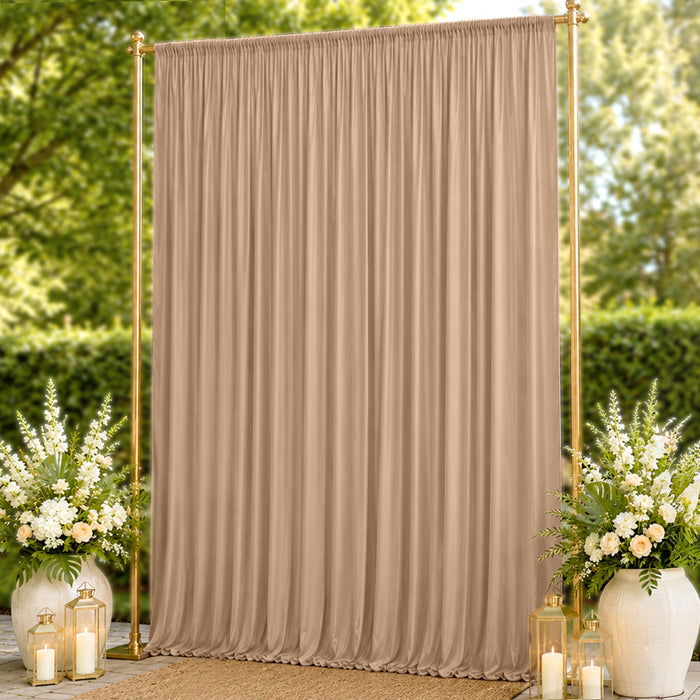 Gold frame backdrop with beige draped curtain and floral arrangements outdoors
