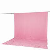 Pink fabric backdrop draped on studio backdrop stand with floor sweep#whtbkgd
