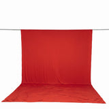 Red backdrop curtain on studio backdrop stand, photography background