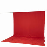 Red photography backdrop with floor-to-ceiling seamless fabric on support rod#whtbkgd