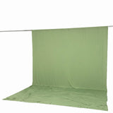 Green fabric backdrop with floor sweep on a hanging support rod#whtbkgd