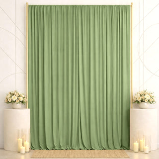 Elegant sage green curtain backdrop with floral pedestals and candles