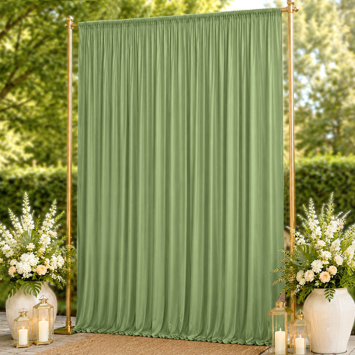 Green draped wedding backdrop with gold frame and floral lantern decor