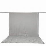 Gray fabric backdrop on seamless studio background, photo shoot setup