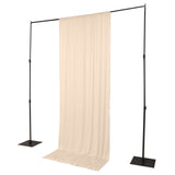 Adjustable photo backdrop stand with beige curtain on white background
