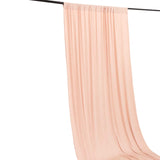 Blush pink sheer curtain panel hanging from rod