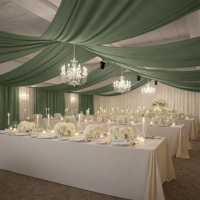 Elegant banquet setup with floral centerpieces and chandeliers in a decorated venue.