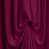 Abstract magenta satin curtain folds with dramatic draped texture#whtbkgd