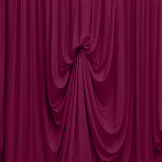 Abstract magenta draped fabric curtain texture background