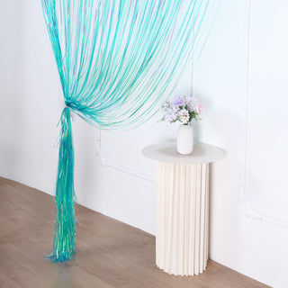 Create a Stellar Party Backdrop with the Iridescent Blue Metallic Tinsel Foil Fringe Curtain