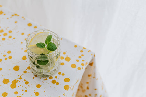 Polka dot table setting with sunflowers and teapot