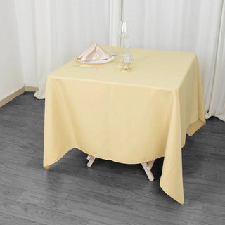 Elevate Your Event with the 70"x70" Champagne Premium Seamless Polyester Square Tablecloth