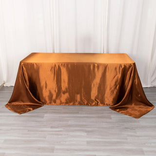 Elevate Your Event with the Cinnamon Brown Satin Seamless Rectangular Tablecloth