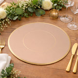 Elegant round placemat with gold rim on a wooden table setting.
