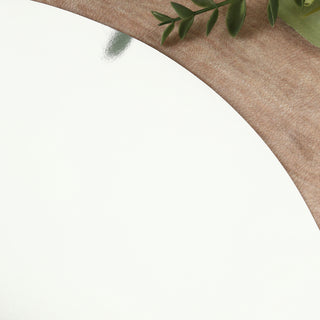 Reflective circular mirror with natural wood background.