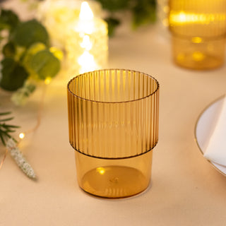 <span style="background-color:transparent;color:#000000;">Unique Amber Gold Ribbed Design Plastic Tumblers</span>