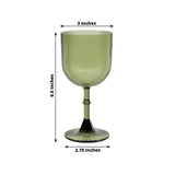 Green ribbed glass goblet, 6.5 inches tall, 3 inches wide, 2.75 inches base diameter.