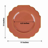 Coral scalloped plate with gold trim, 11 inches wide and 6.5 inches diameter center.