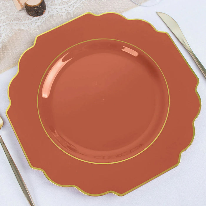 Rustic scalloped dinner plate in terracotta with gold trim