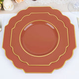 Elegant brown and gold decorative plates stacked on a table.