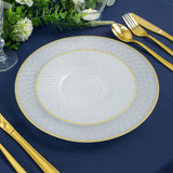 Elegant decorative plate with intricate design and gold rim on a blue table setting.
