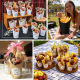 Assorted gourmet snack cups and fries for outdoor gatherings and events.