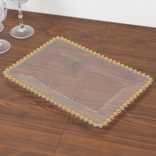 <h3 style="margin-left:0px;"><span style="background-color:transparent;color:#000000;">Clear Acrylic Rectangular Serving Trays with Beaded Gold Rim</span>