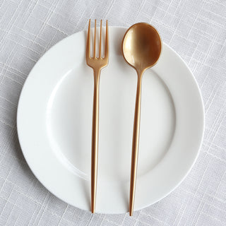 <p style="margin-left:0px;"><strong>Versatile and Cost-Effective – Gold Dessert Utensils&nbsp;&nbsp;&nbsp;&nbsp;&nbsp;</strong></p><p style="margin-left:0px;">The Gold Heavy Duty Plastic Dessert Forks and Spoons set is a valuable addition for any event planner's toolkit due to its versatility. These tools can be used for various events, such as fancy weddings and corporate functions as well as laid-back birthday celebrations and family get-togethers.</p><p style="margin-left:0px;">The timeless gold appearance matches different styles and color palettes, making them blend effortlessly with the decoration of your event. You can pair them with luxurious <a href="https://tableclothsfactory.com/collections/round-tablecloths"><u>tablecloths</u></a> for a formal event or mix them with <a href="https://tableclothsfactory.com/collections/plastic-plates"><u>disposable plates</u></a> and cups for a more relaxed setting.</p><p style="margin-left:0px;">These tools are not only versatile but also affordable. Throwing a big event may come with a high price tag, but with these<strong> disposable forks</strong> and spoons, you can cut costs without compromising on style or quality. Their reasonable cost enables you to offer a lavish dining experience to your guests without spending a lot of money. Their elegant design and durability, along with their affordability, make them a perfect option for any occasion. You can create an impressive <strong>table arrangement</strong> that wows your guests and elevates the ambiance of your event.</p><p style="margin-left:0px;">Informational</p>