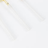 White ribbed hanging pendant light on a minimal white background