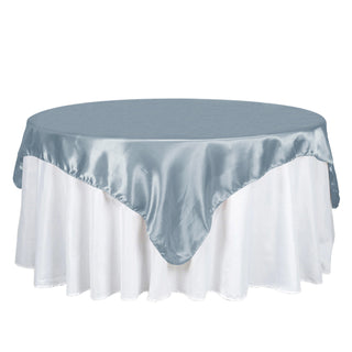 Elevate Your Event Decor with the 72" x 72" Dusty Blue Seamless Square Satin Tablecloth Overlay